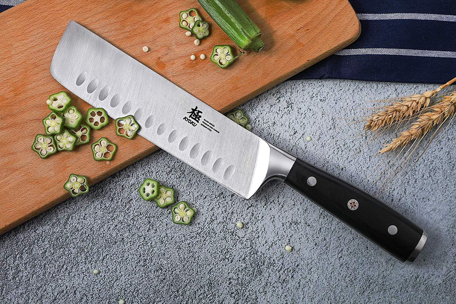 KYOCERA > The versatile nakiri gets the job done! The sharp wide blade  scoops up veggies fast!